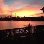 Sunset Serenity!!-Tropical Waterfront Oasis-Huge Private Patio-10Min To Kingst & Beaches